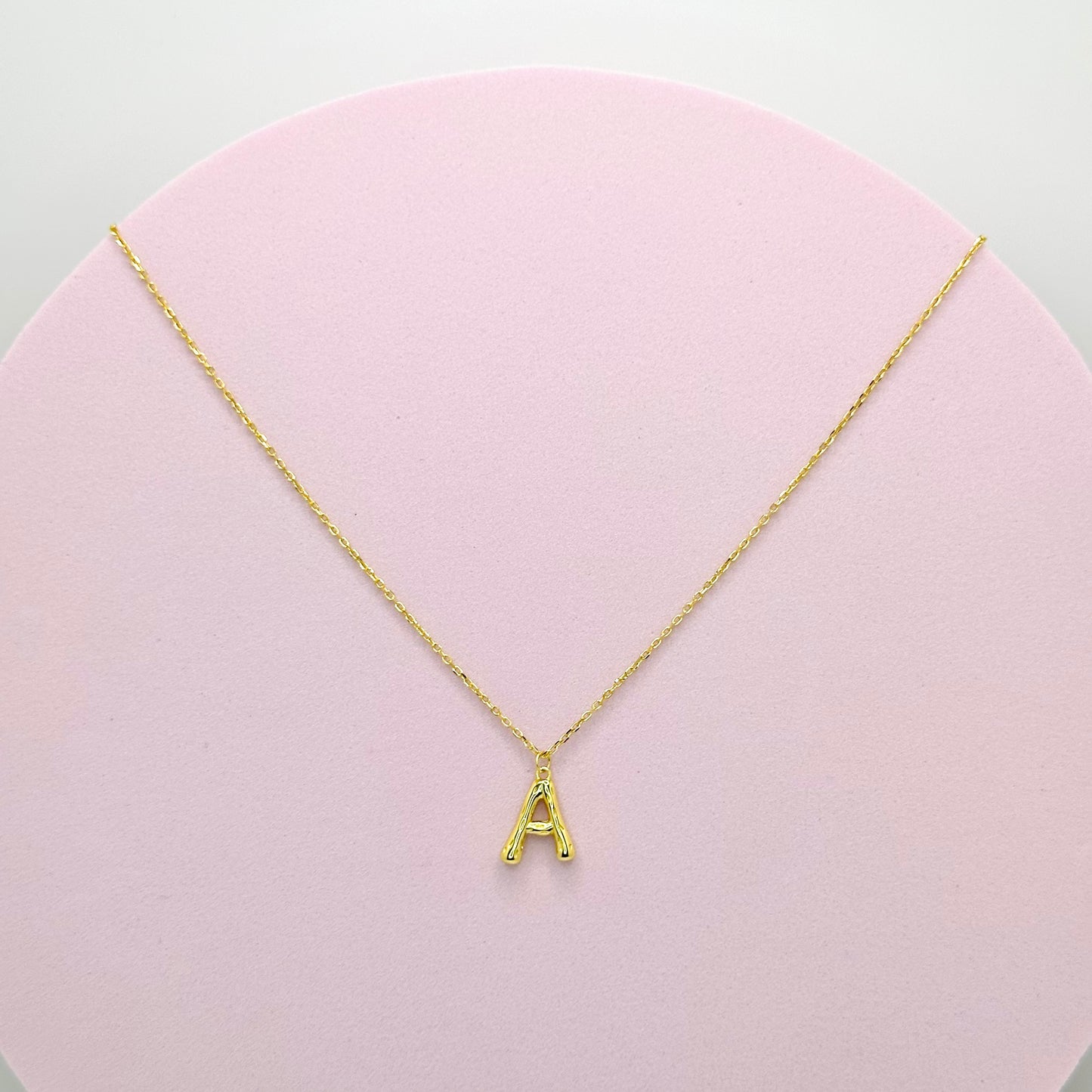 GLOBE LETTER NECKLACE